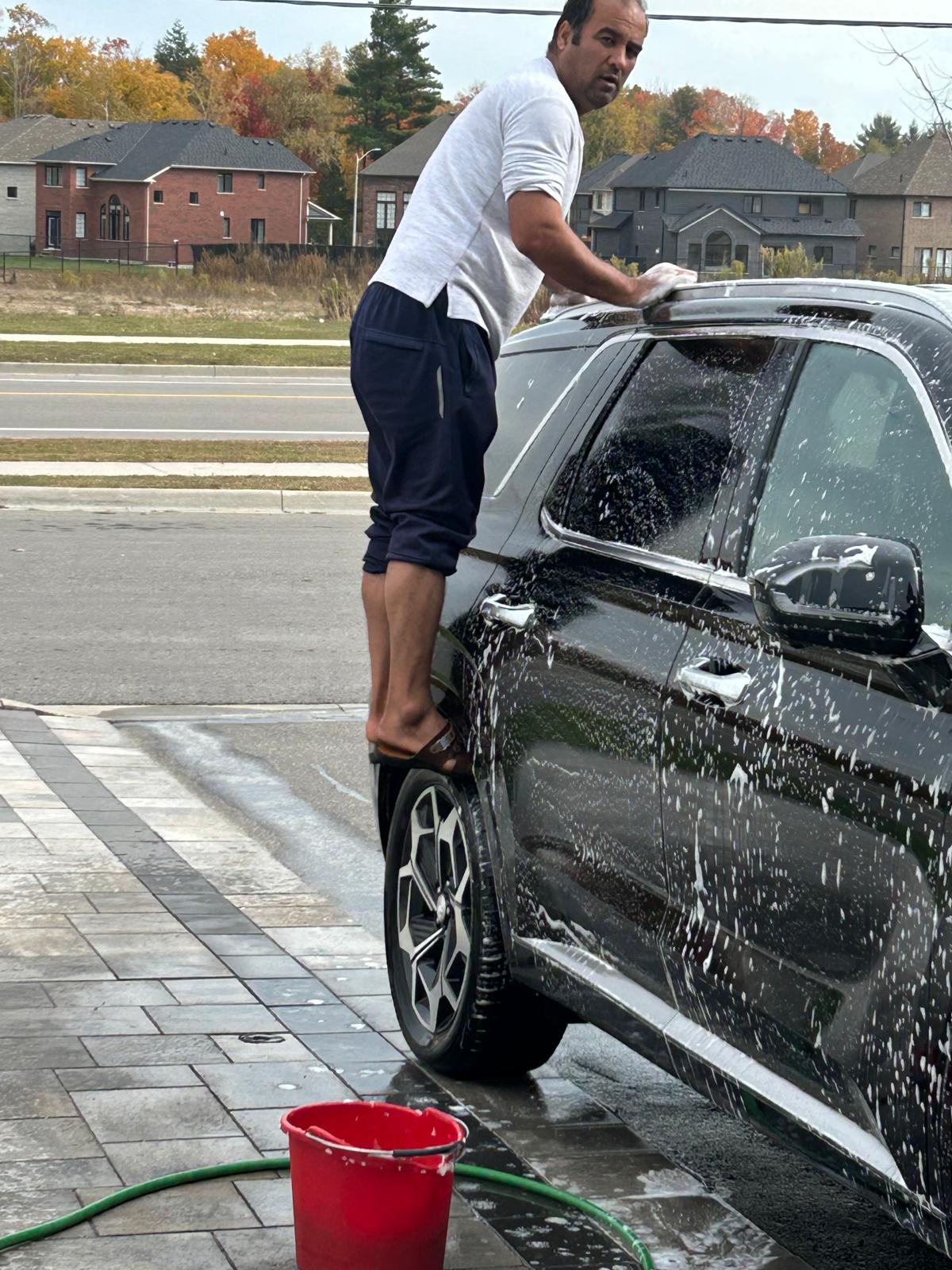 Saeed hand-washing the Airport Run Palisade