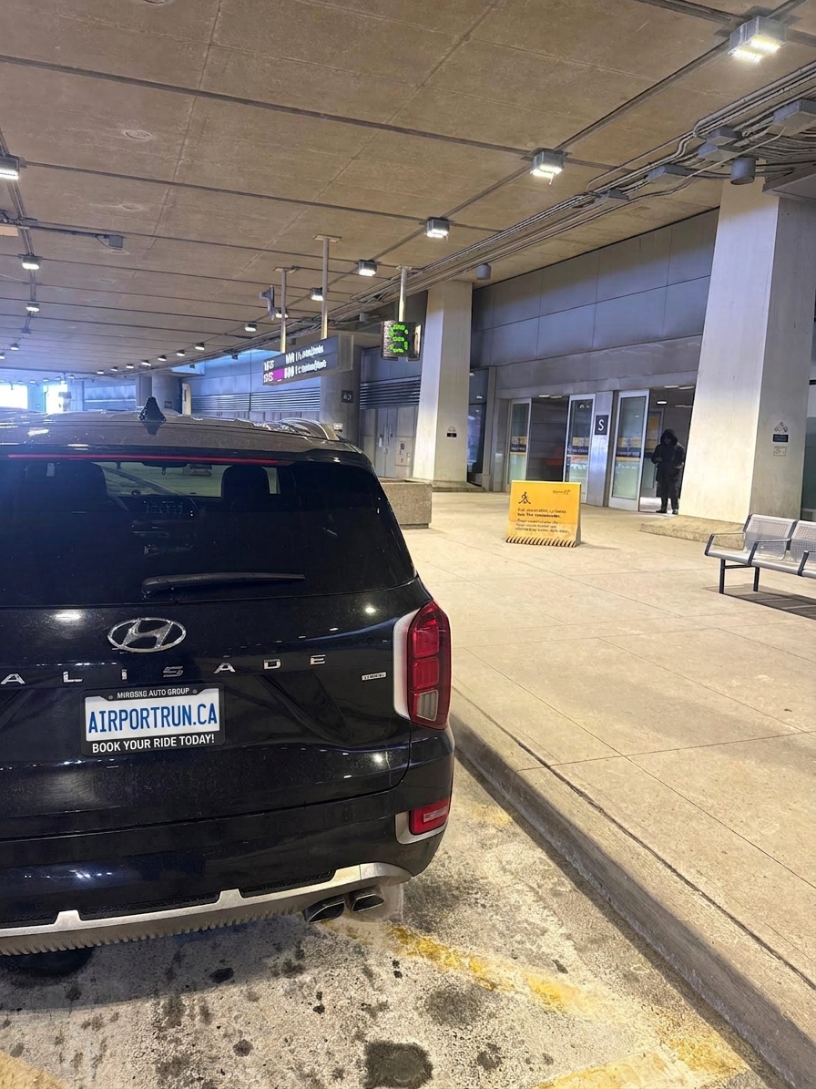 Airport Run vehicle waiting at the Toronto Pearson arrivals terminal