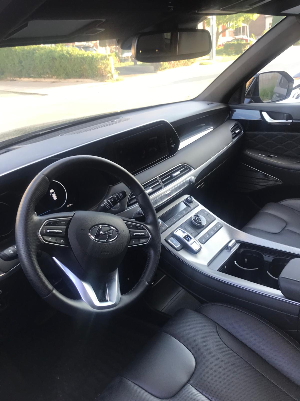 Premium black-leather cabin and console of the Airport Run Palisade